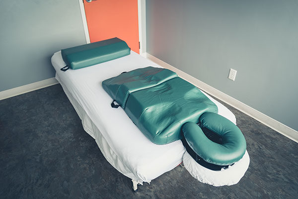 Body cushions on a massage table