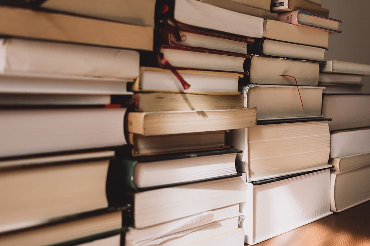 Stacks of textbooks for massage therapy training