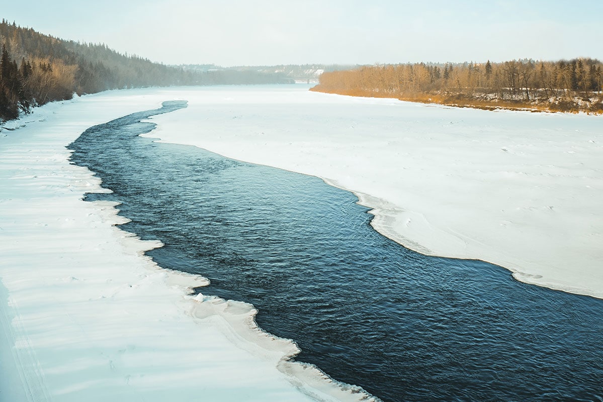 Frozen and icy North Saskatchewan River on a cold day