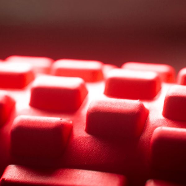 A closeup view of a knobbed foam roller
