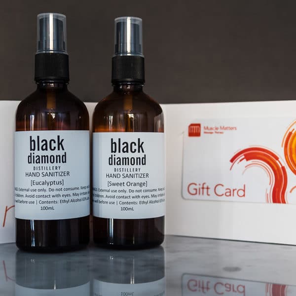 Feature image Two bottles of Black Diamond hand sanitizer and a Muscle Matters gift card